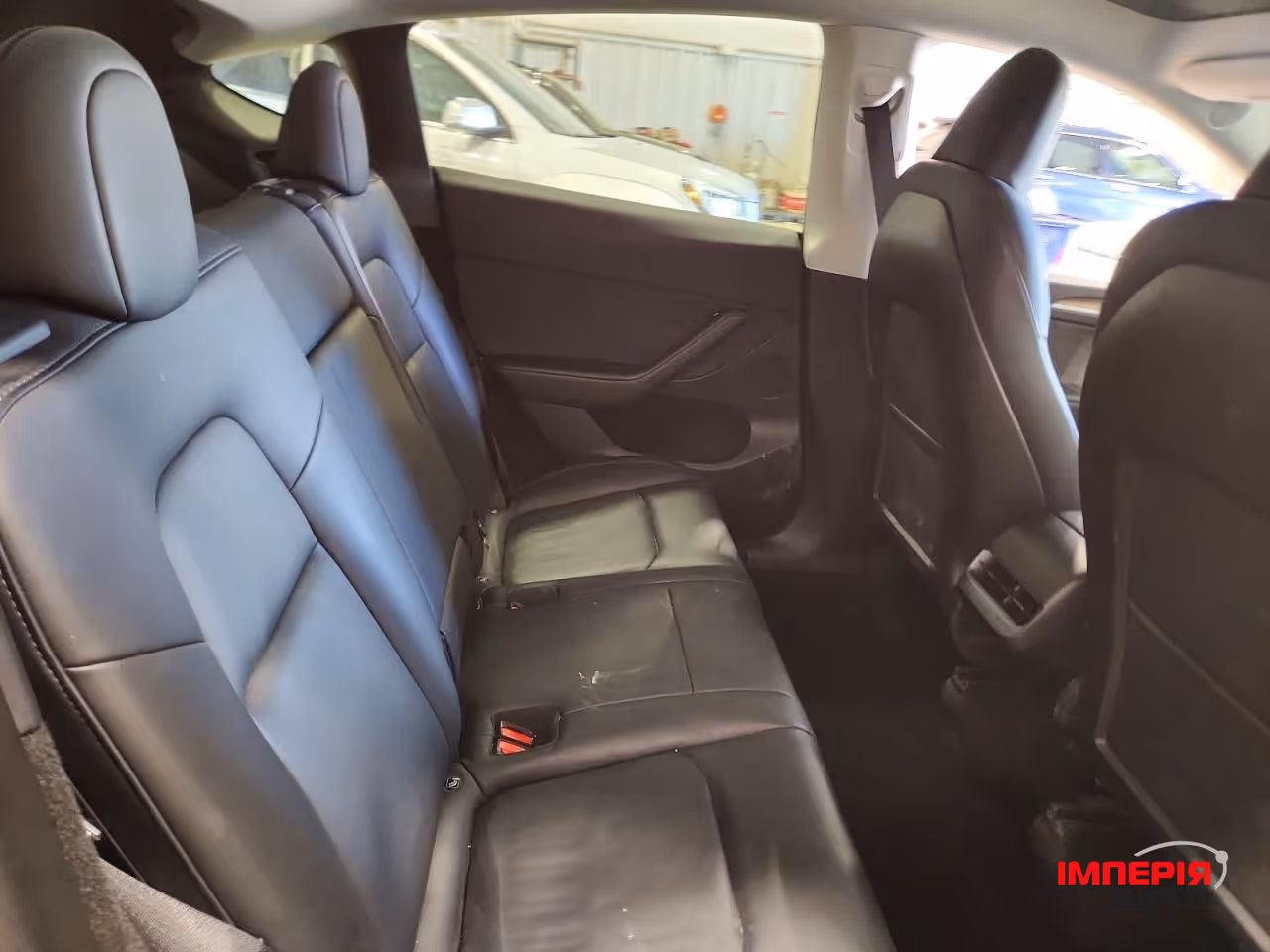 Tesla Model Y - фото 11