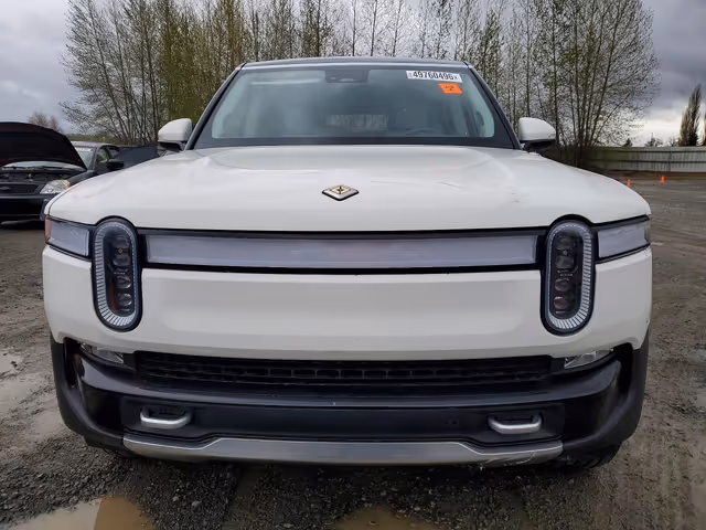 Rivian R1S - фото 1