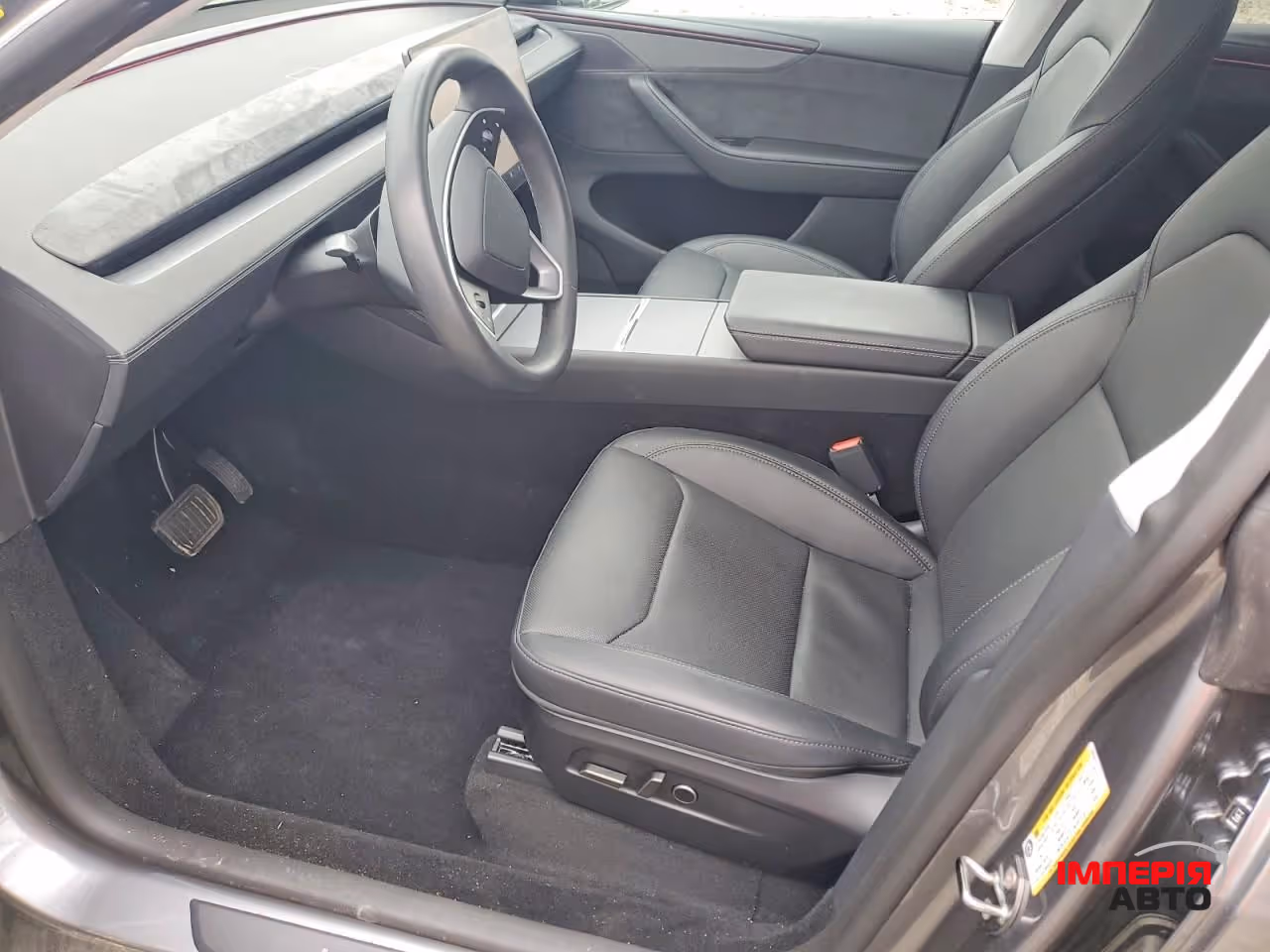 Tesla Model Y - фото 7