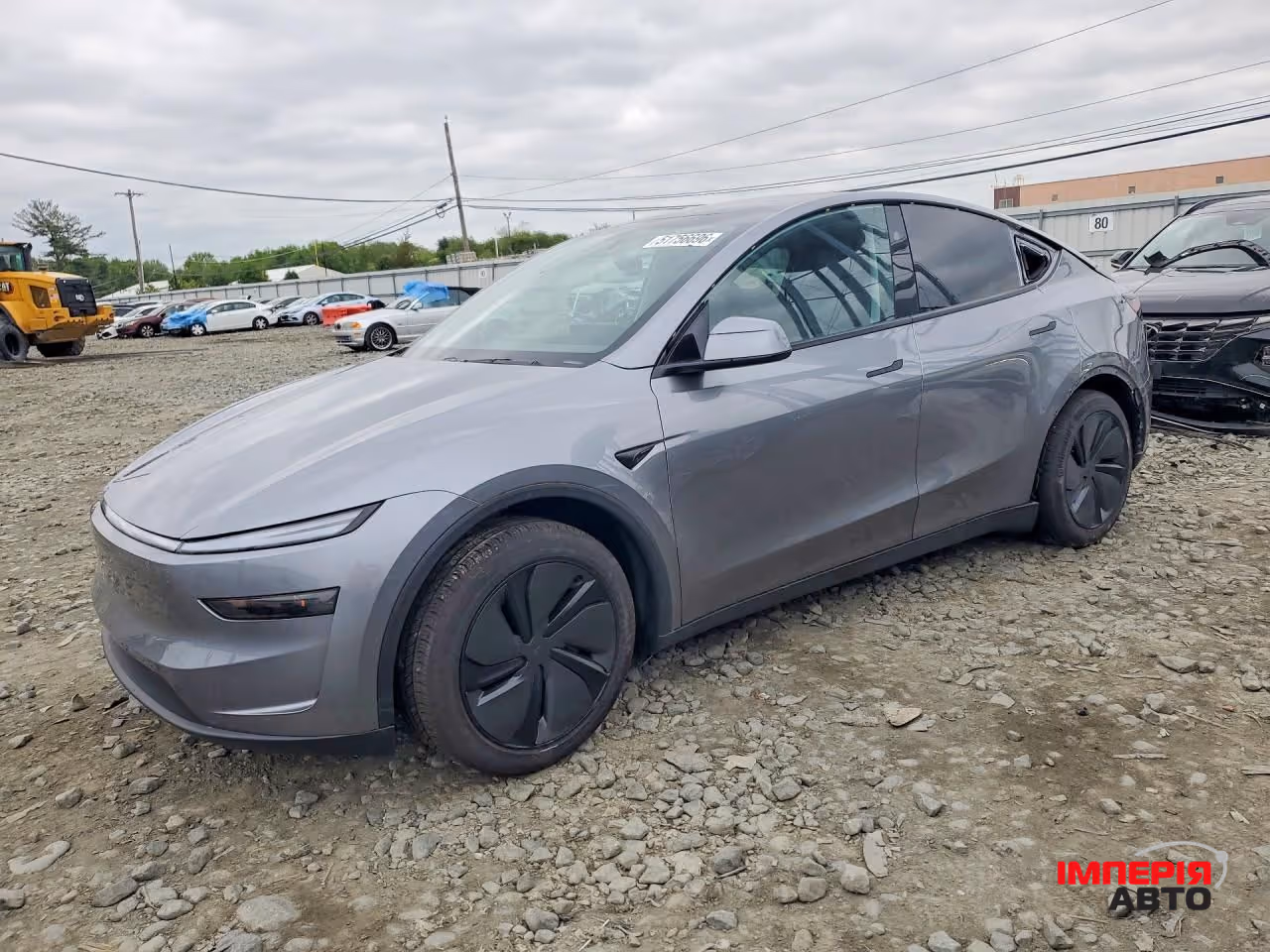 Tesla Model Y - фото 1