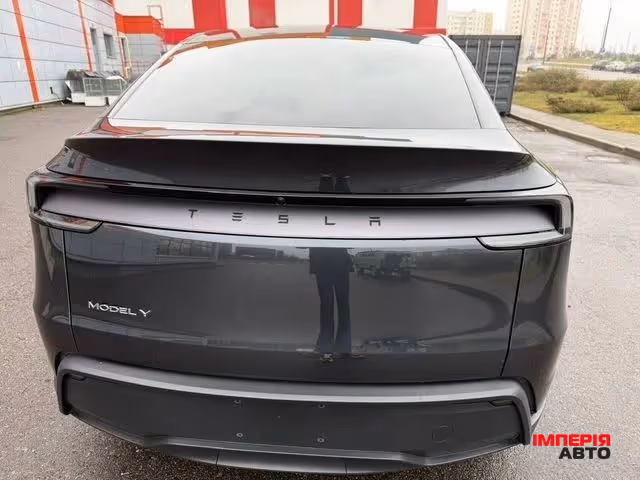 Tesla Model Y - фото 12