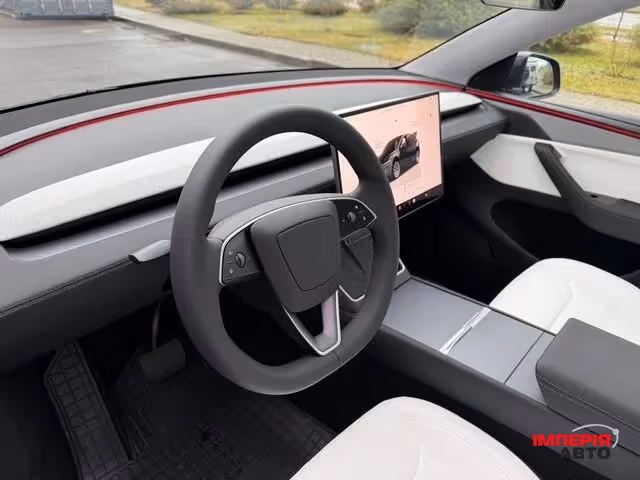 Tesla Model Y - фото 20
