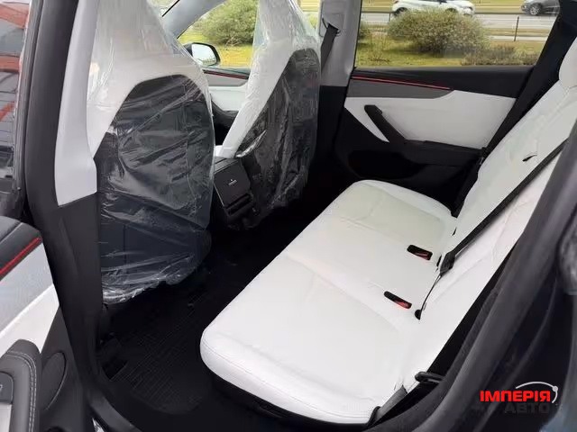 Tesla Model Y - фото 15