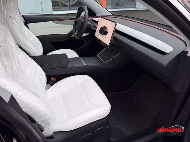 Tesla Model Y - фото 17