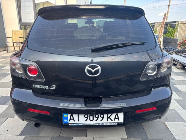 Mazda 3 - фото 3