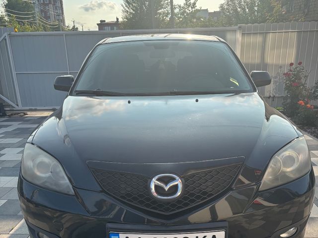 Mazda 3 - фото 1