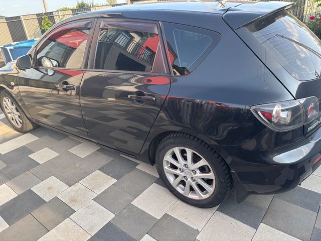 Mazda 3 - фото 4