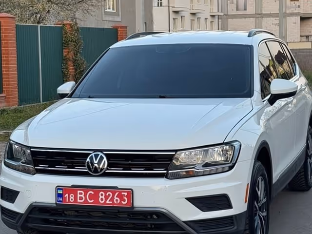 Volkswagen Tiguan - фото 1