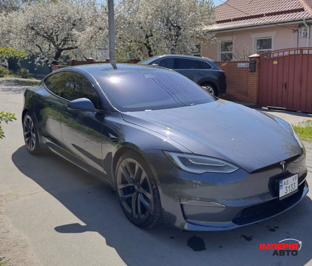 Tesla Model S - фото 1