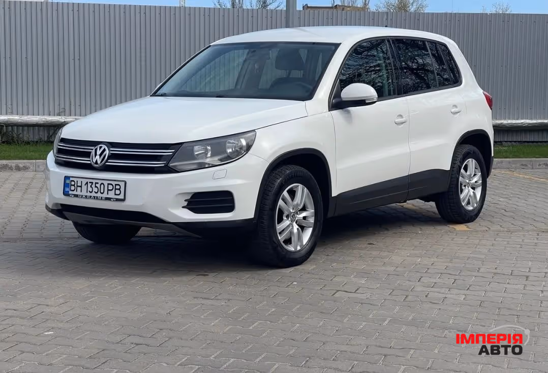 Volkswagen Tiguan - фото 1