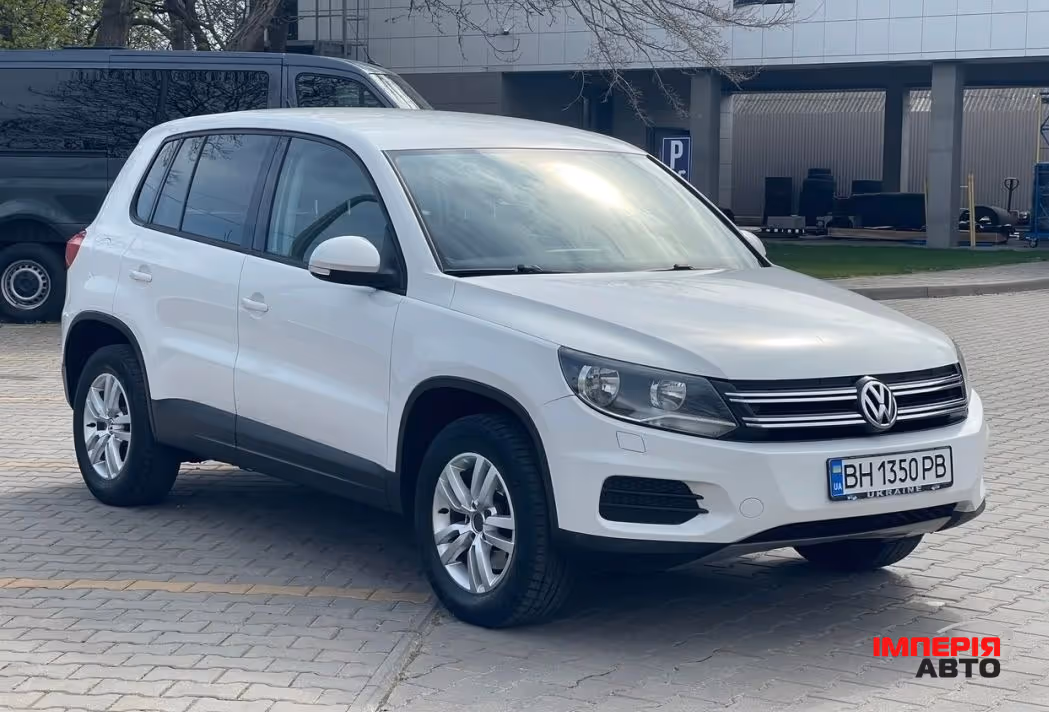 Volkswagen Tiguan - фото 6