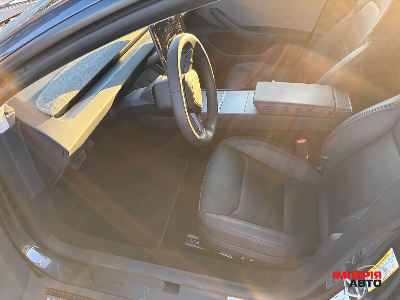 Tesla Model 3 - фото 9