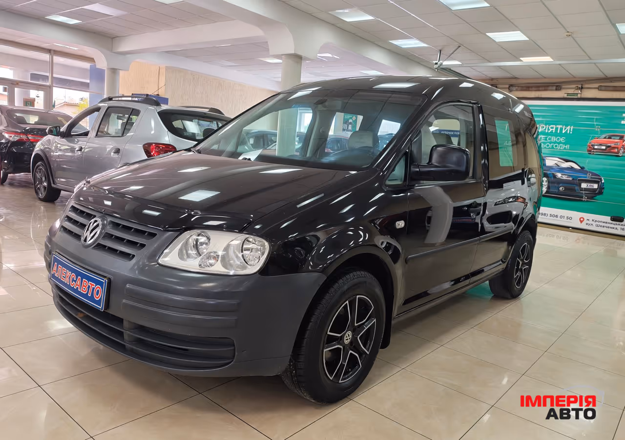 Volkswagen Caddy - фото 1