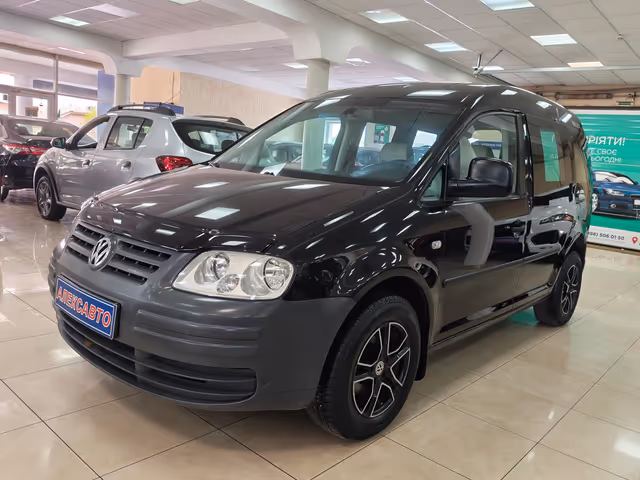 Volkswagen Caddy - фото 1