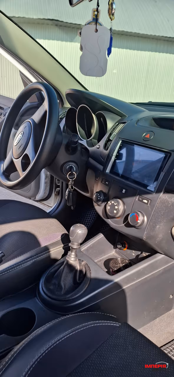 Kia Cerato - фото 7