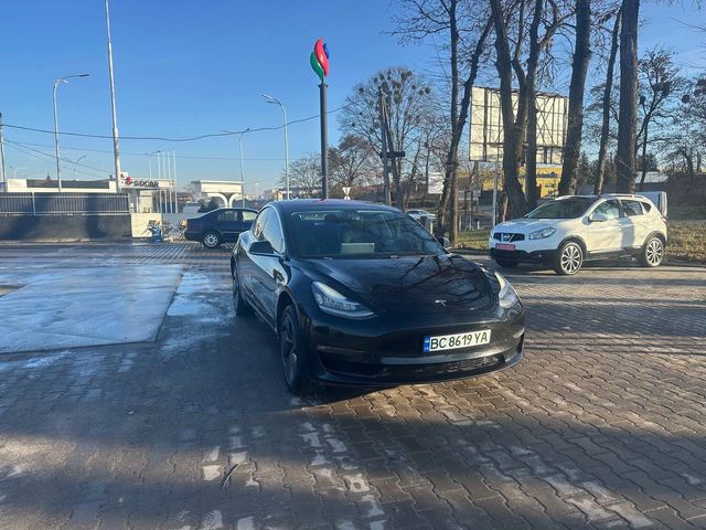 Tesla Model 3 - фото 1