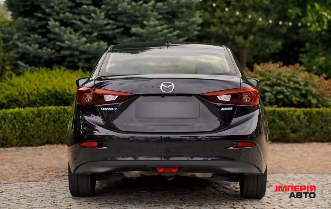 Mazda 3 - фото 12