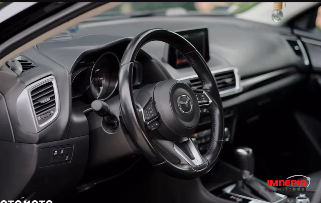Mazda 3 - фото 38