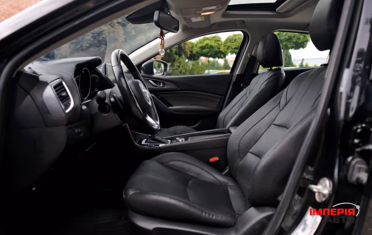 Mazda 3 - фото 32