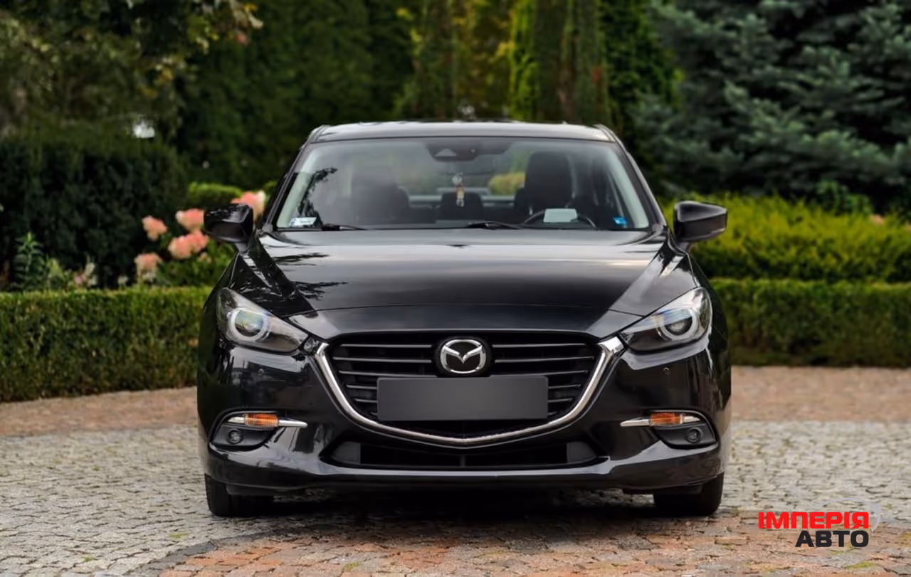Mazda 3 - фото 14