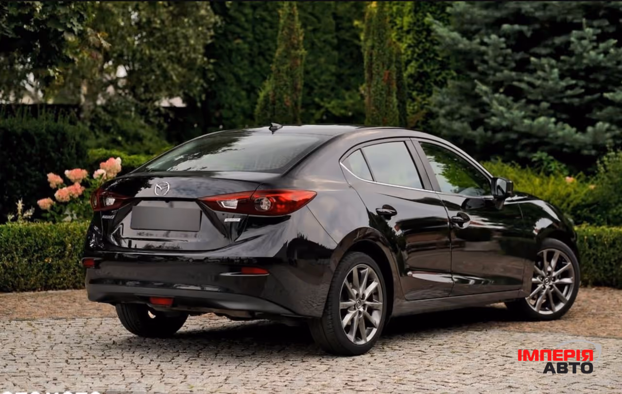 Mazda 3 - фото 8