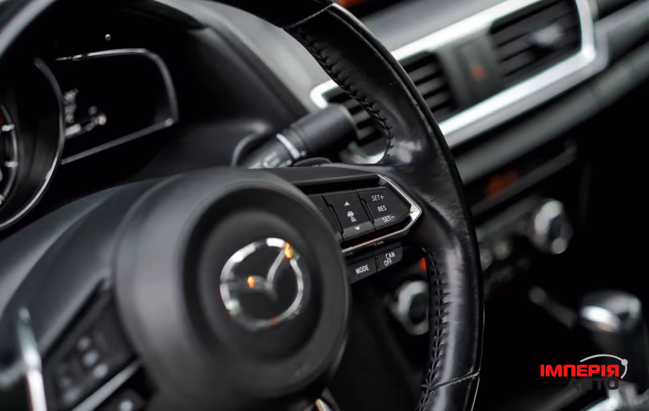 Mazda 3 - фото 34