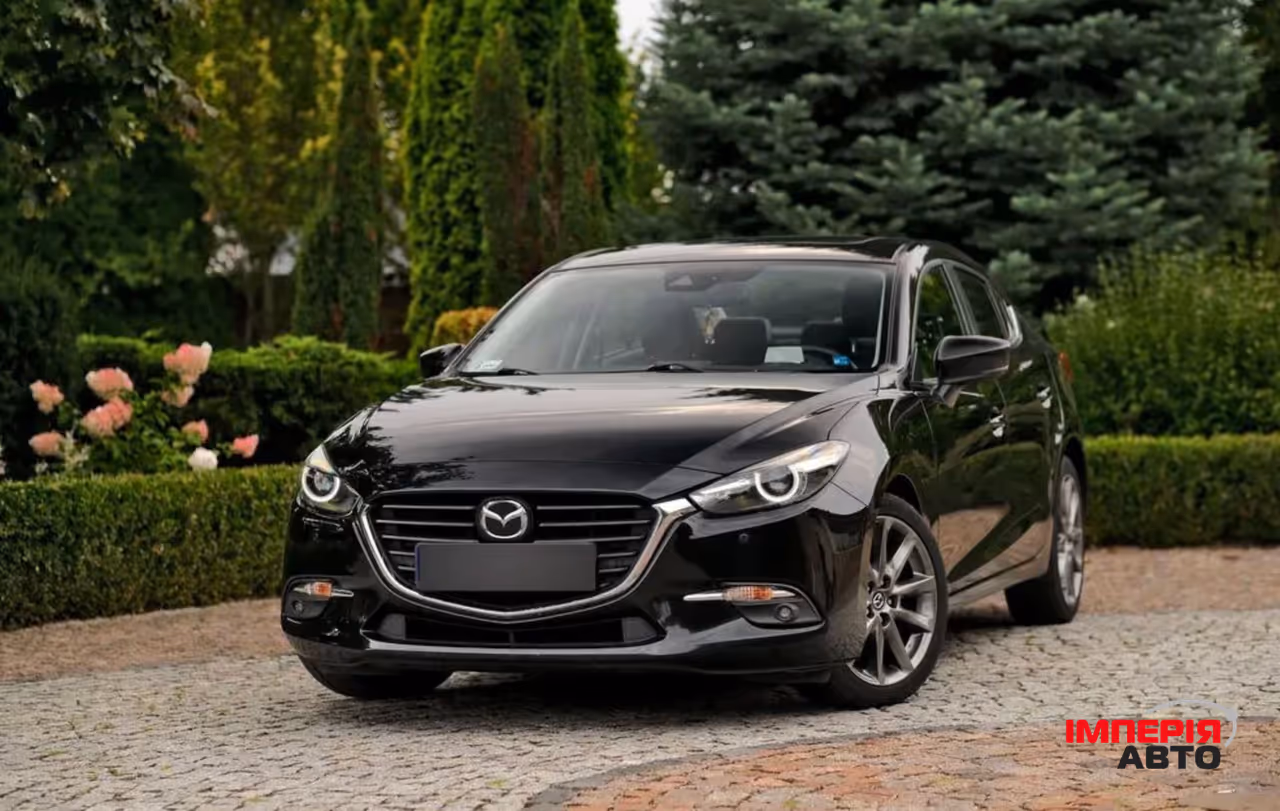 Mazda 3 - фото 2