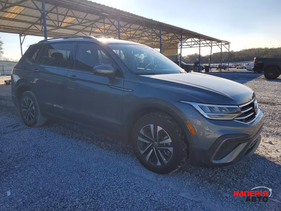 Volkswagen Tiguan - фото 4