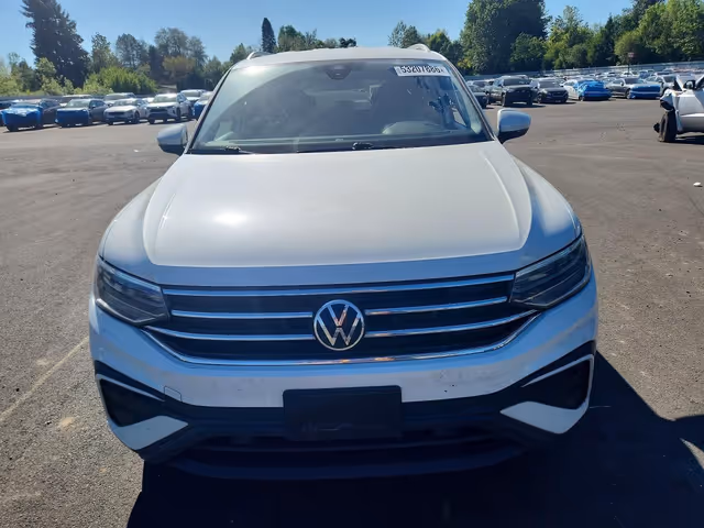 Volkswagen Tiguan - фото 1