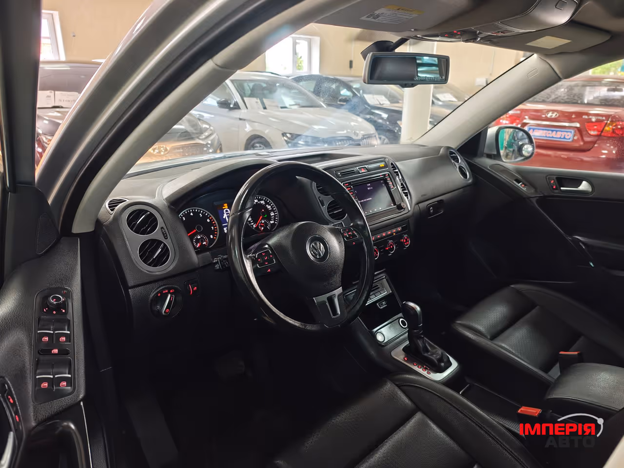 Volkswagen Tiguan - фото 9