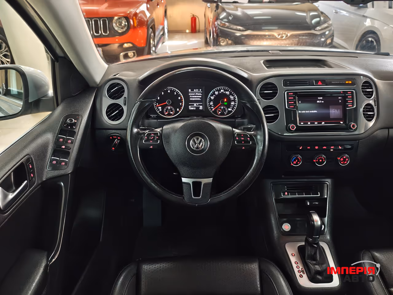 Volkswagen Tiguan - фото 11
