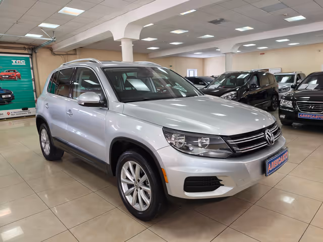 Volkswagen Tiguan - фото 1