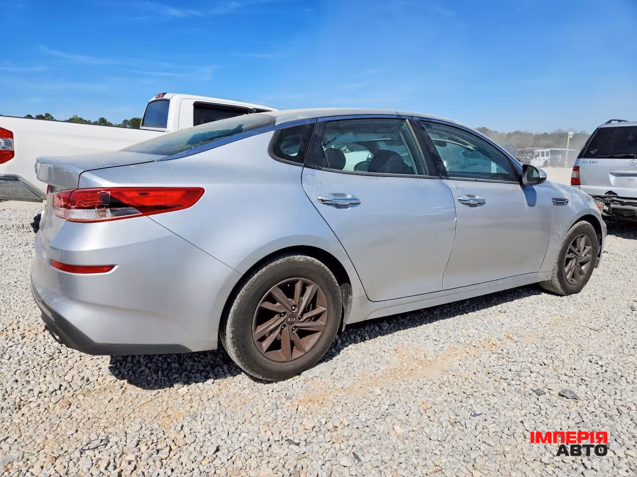 Kia Optima - фото 6