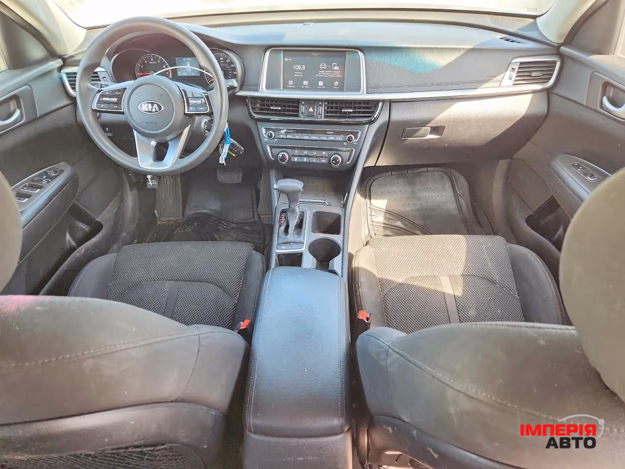 Kia Optima - фото 7