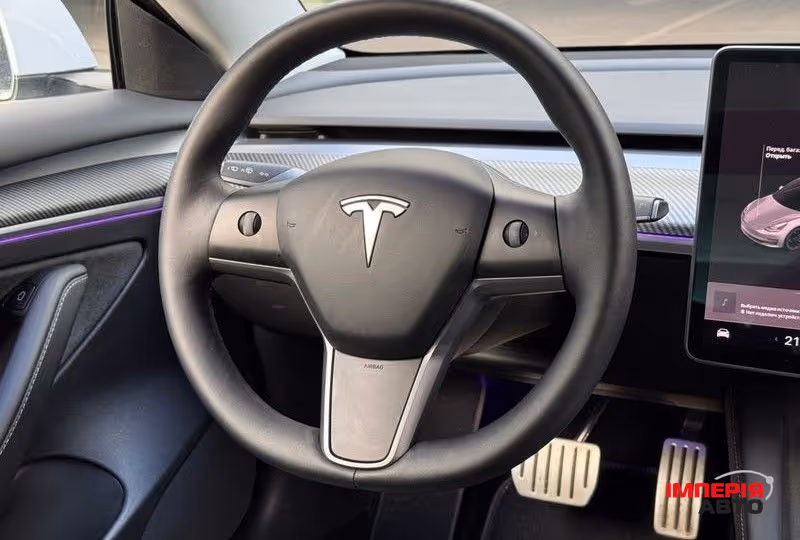 Tesla Model 3 - фото 10