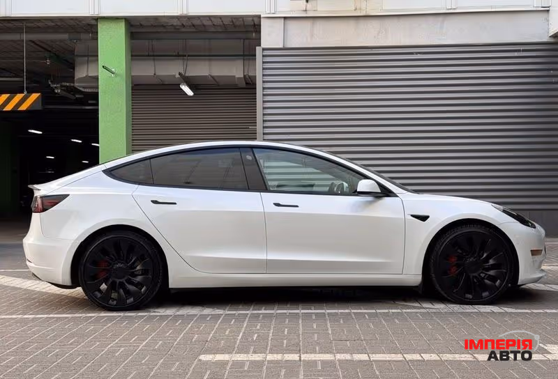 Tesla Model 3 - фото 7