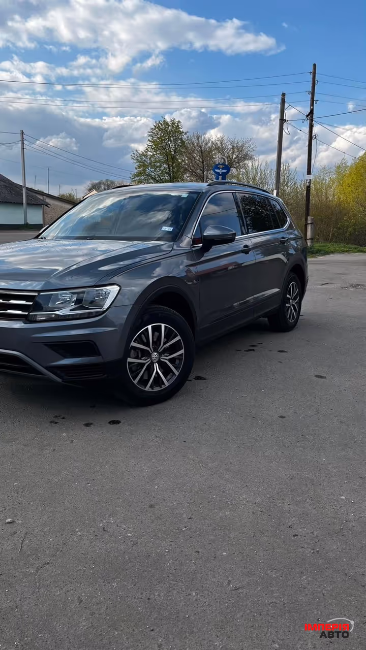 Volkswagen Tiguan - фото 1