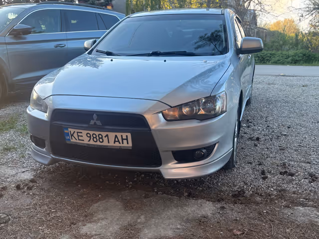 Mitsubishi Lancer - фото 1
