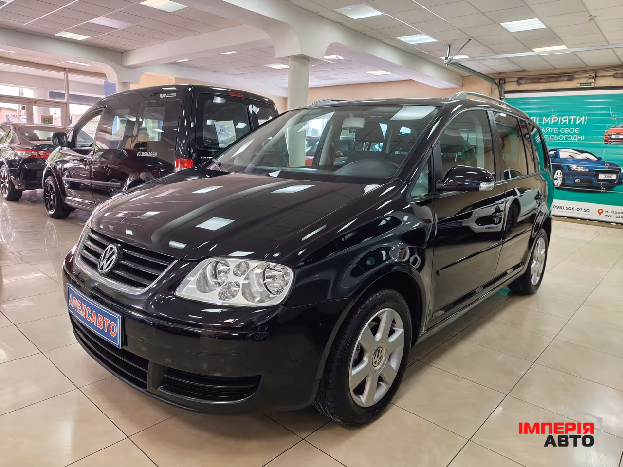 Volkswagen Touran - фото 3