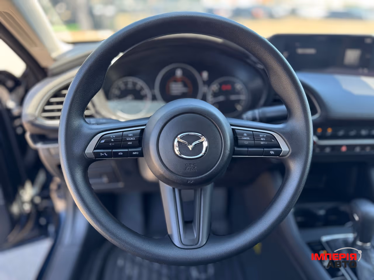 Mazda 3 - фото 10