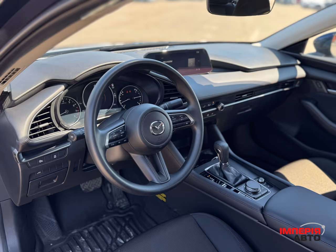 Mazda 3 - фото 12