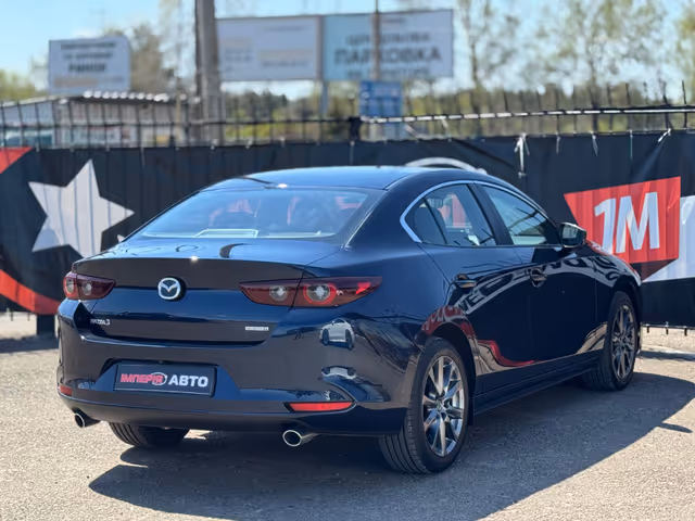 Mazda 3 - фото 4