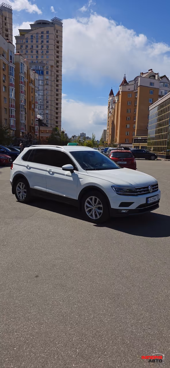 Volkswagen Tiguan - фото 2