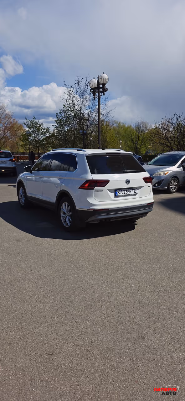 Volkswagen Tiguan - фото 8