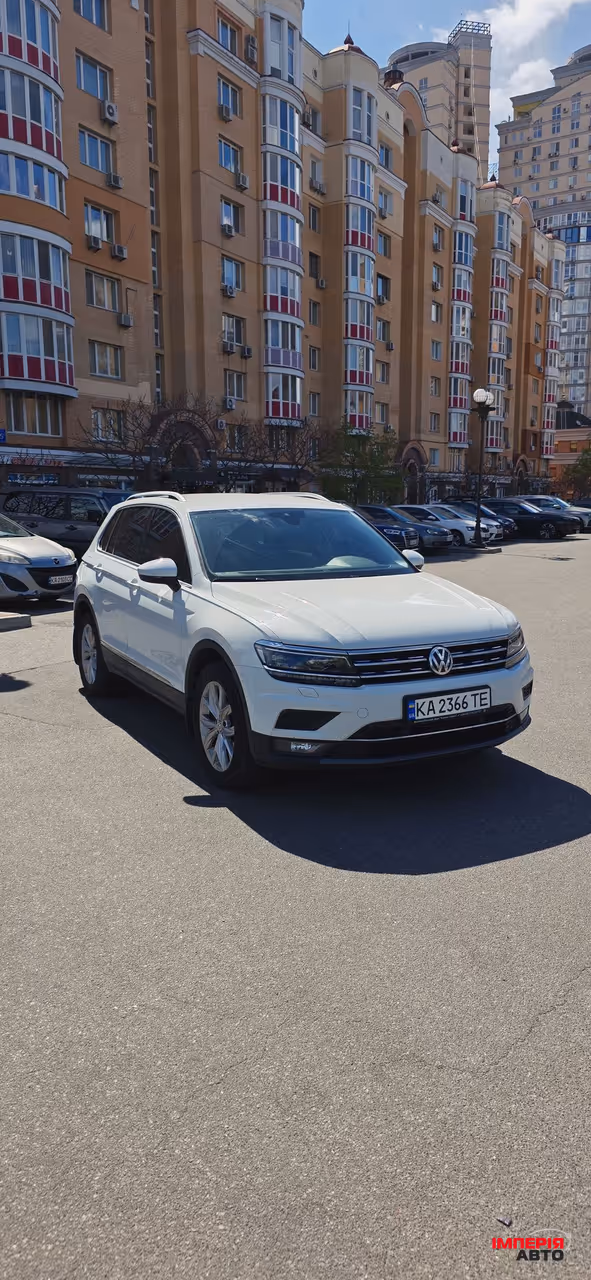 Volkswagen Tiguan - фото 1