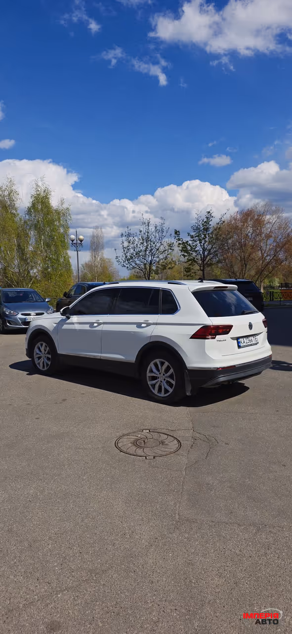 Volkswagen Tiguan - фото 6