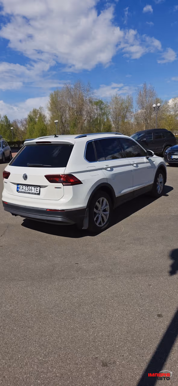 Volkswagen Tiguan - фото 7
