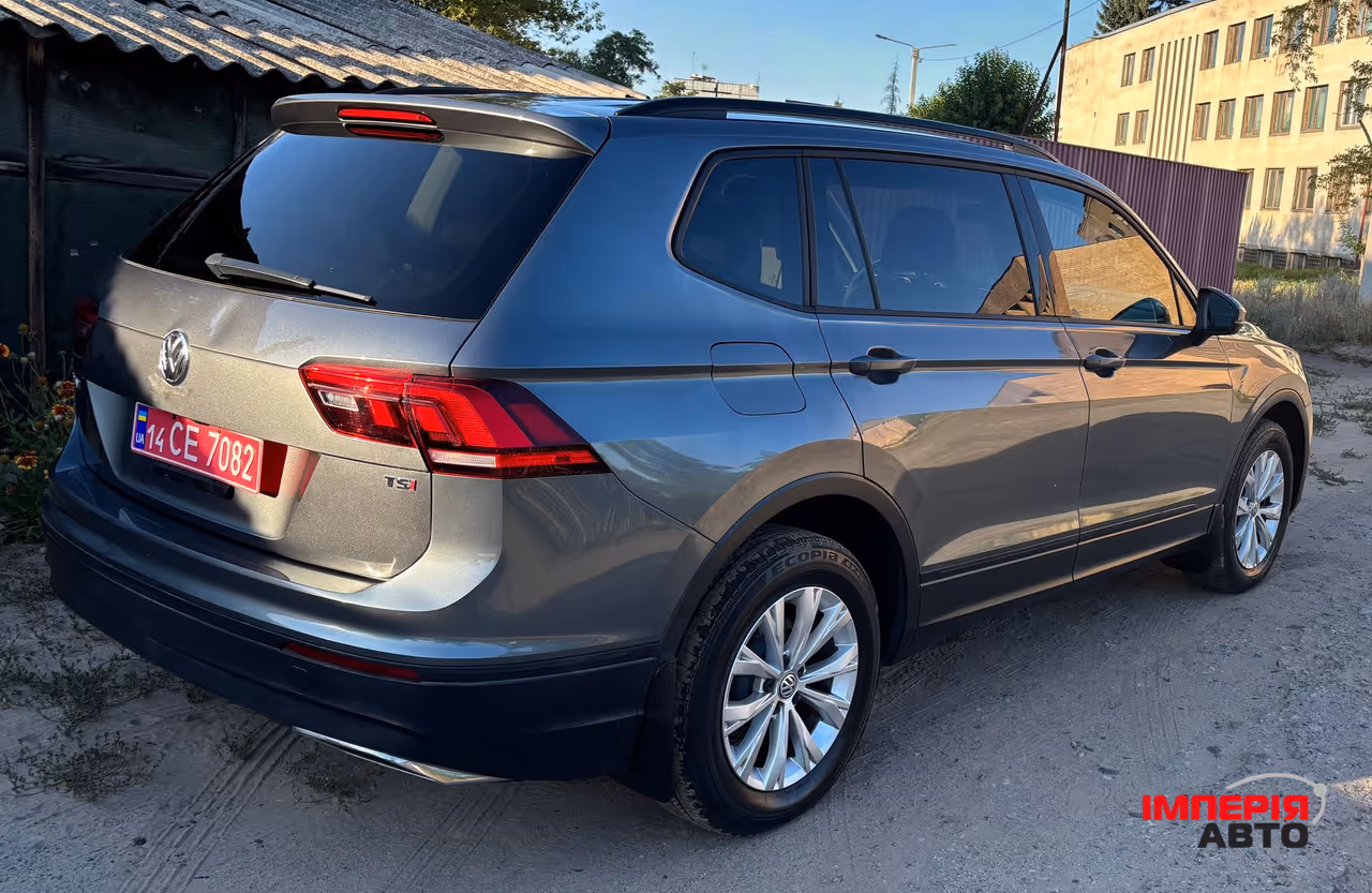 Volkswagen Tiguan - фото 1