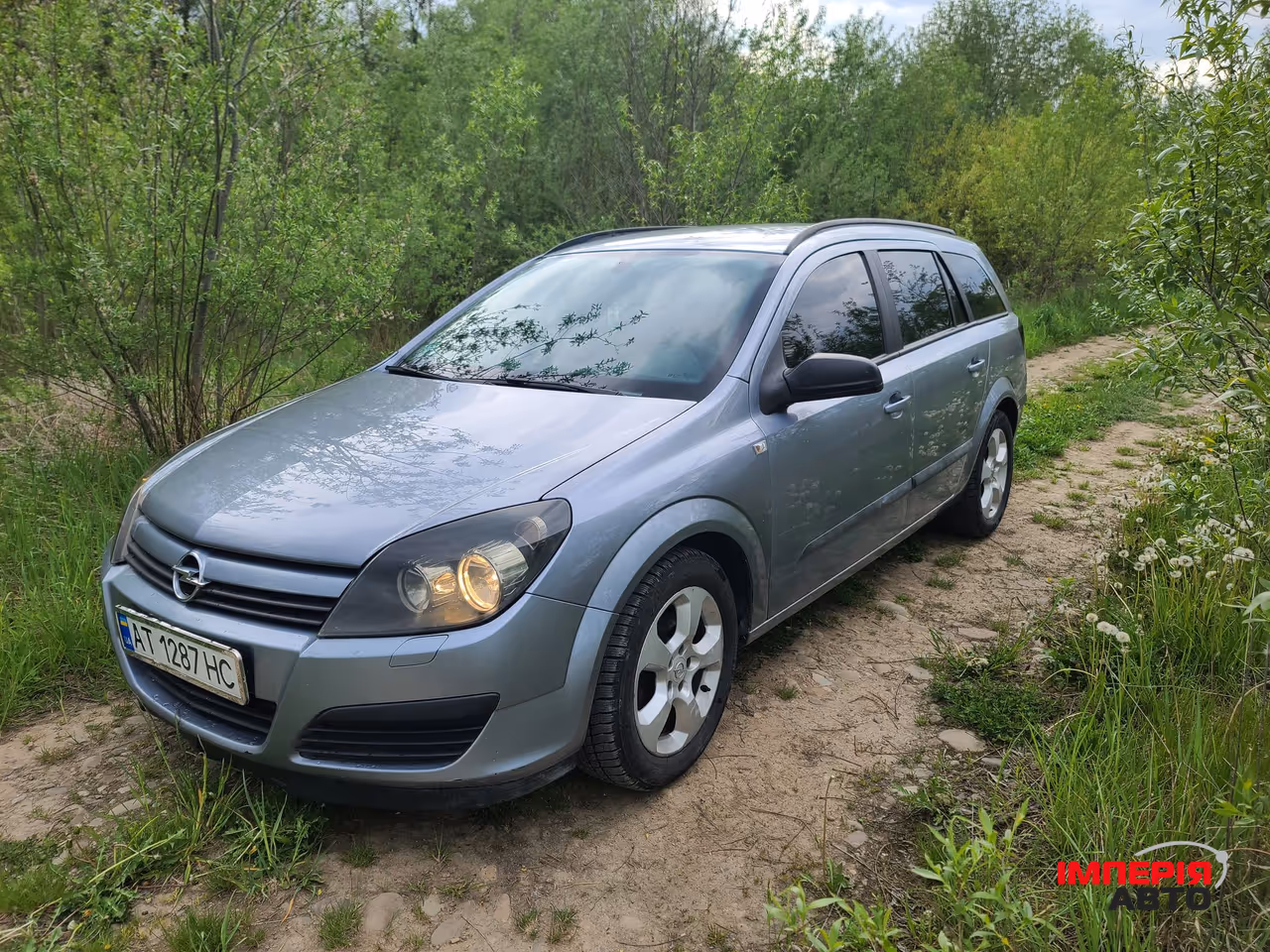 Opel Astra - фото 1