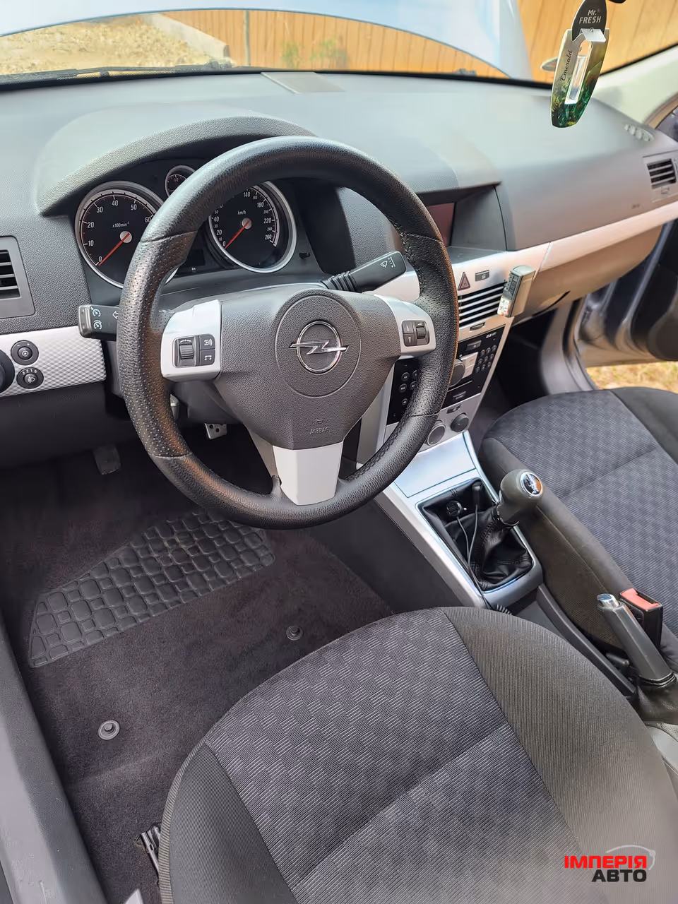 Opel Astra - фото 11